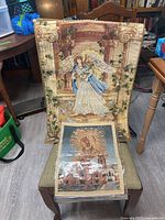 Full view of both tapestries, angel design behind, Madonna design in front