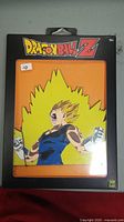 Front view of the sealed DragonBall Z fridge magnet packaging showing Super Saiyan Vegeta illustration.