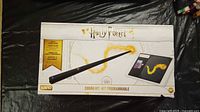 Boxed Harry Potter programmable coding kit with wand image on box.