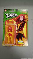 Front view of sealed Dark Phoenix figure card showing figure, name, and character artwork.