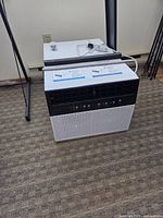 Front view of Costway air conditioner showing vents and controls