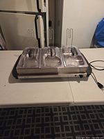 Full view of three-section buffet server on table