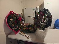 All three wreaths displayed on table