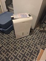 Front view of Danby dehumidifier showing water-level window and overall condition