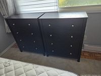 Both dressers side by side showing front view and drawer arrangement