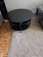 Top view of round black coffee table