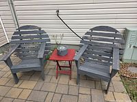 Both Adirondack chairs on patio