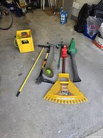 Overview of all yard tools on floor