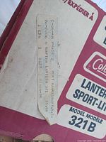 Close-up of price label and model info on Coleman box