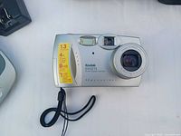 Front view of Kodak DX3215 camera showing model details