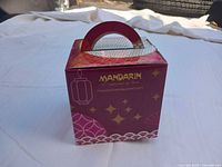 Front view of boxed Mandarin Restaurant tea set