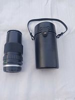 Lens and carry case side by side