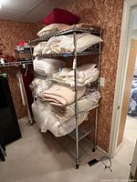 Full view of the shelving unit loaded with household items for scale.