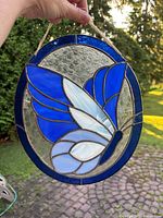 Front view in natural light showing full butterfly motif and colors