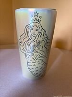 Front view of tumbler showing Siren illustration