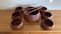 Complete 10-piece teak salad set displayed