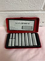 Closed red metal case showing label for 9-piece 1/4" drive deep socket set