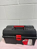 Full view of closed toolbox showing size and colour