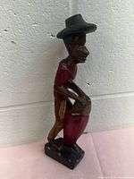 Front view of carved wood figurine