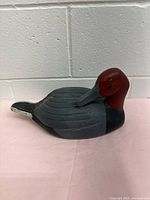 Left side view of full wooden duck decoy