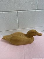 side view of full wooden duck decoy