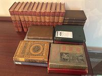 Overall lot overview showing all books on table