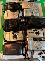 Overview of ten cameras arranged in two columns showing various brands and colors