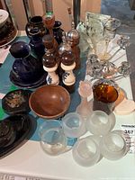 Lot of assorted glass and porcelain kitchen and decorative items including vases, small bowls, salt and pepper shakers, candle holders