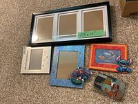 Group shot showing all frames laid on carpet