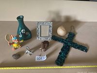 Group shot of all eight decor items laid out on surface