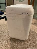 Overall view of Styrofoam cooler standing upright