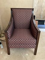 Front view of upholstered armchair