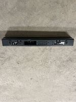 rear view showing HDMI, LAN, coaxial audio, DC power ports and mounting slots