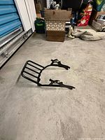 Top view of black steel rear bike rack with mounting arms