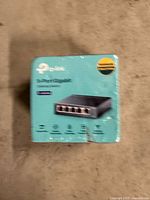 Sealed TP-Link 5-port gigabit switch box