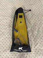 Mesh bag showing Kapitol Reef branding, yellow fins, mask and snorkel