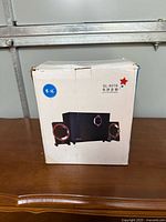 Printed carton showing SL-8018 model and speaker image