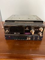 Front view of UR-156 radio with controls and channel buttons
