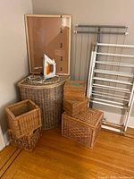 Photo of all items including wicker baskets, drying racks, cork board, and iron stacked together