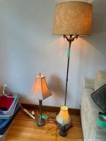 Photo showing all three lamps together: floor lamp, table lamp, and pineapple base bedside lamp.