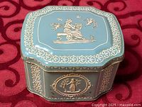 Top view showing classical scene, swirl border and octagonal shape