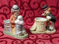 Both ceramic clown candle holders front view