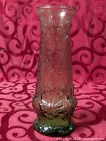 Full view of green textured glass vase front