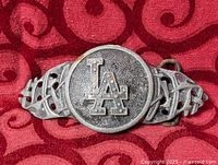 Front view of belt buckle showing full design and condition