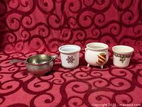 Four items lined on fabric backdrop