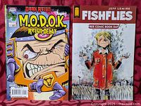 Both comic book fronts displayed side by side