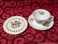 Overview of teacup, saucer and decorative plate