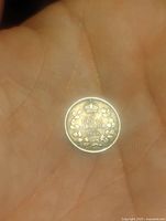 Reverse side displaying '5 CENTS CANADA' denomination, year 1918, with crown and wreath design