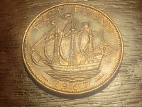 Reverse side of the coin with detailed sail ship and date 1967 along with the denomination Half Penny.