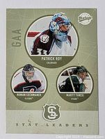Front of the hockey card showing all three players and design elements.